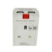 White travel adapter with multiple ports on a white background
