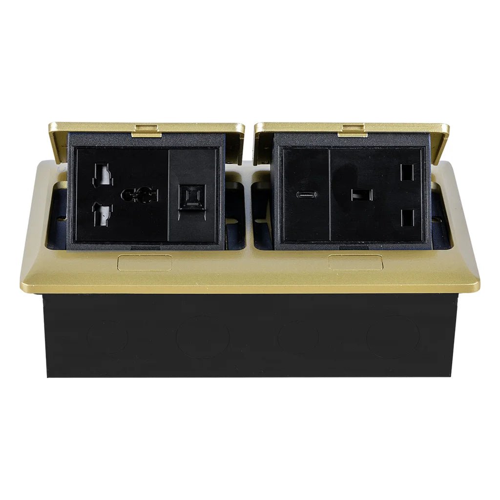 Black electrical outlet with gold trim on a white background