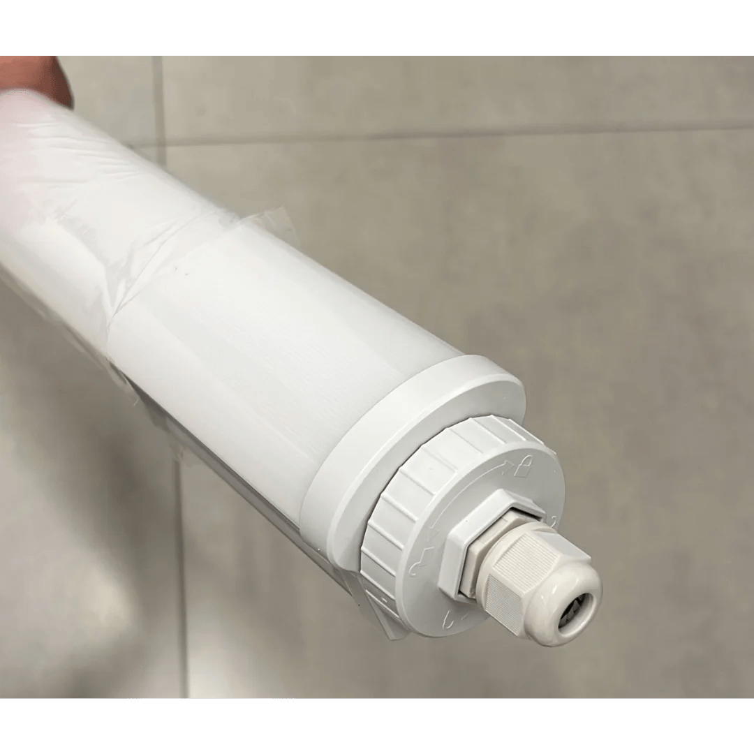 White radiator cover on a tiled wall