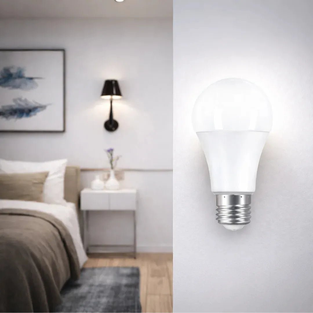 LED light bulb shown next to a bedroom setting with a nightstand and lamp.