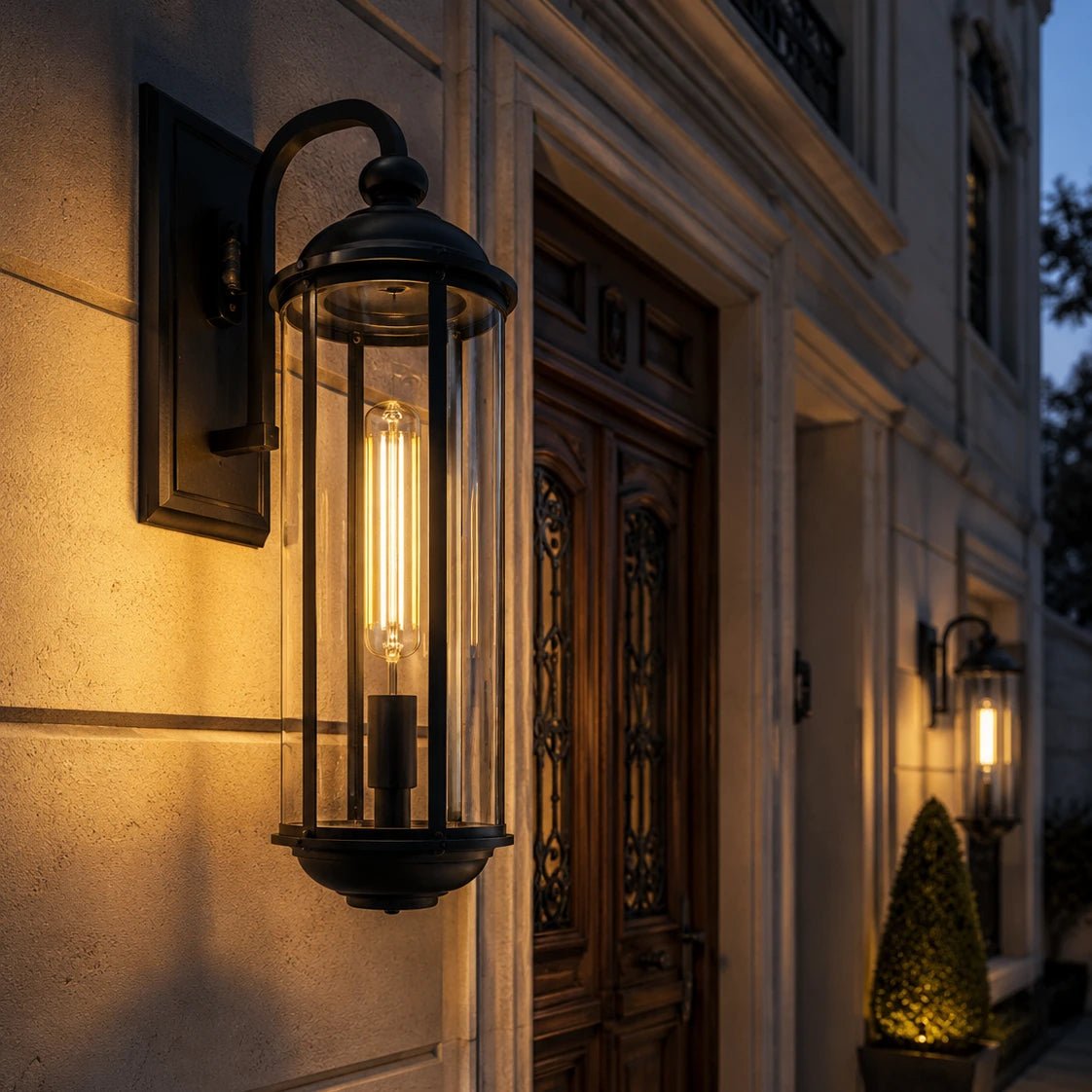 Decorative outdoor wall light fixture on a building exterior.