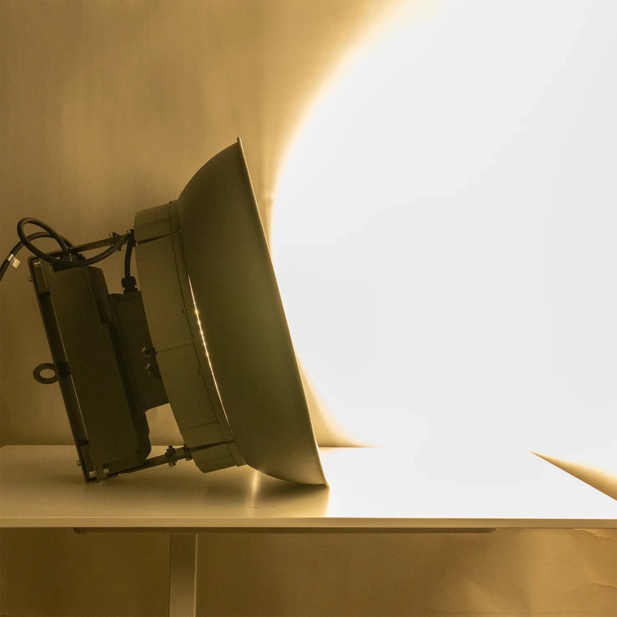 Vintage-style lamp on a white surface with a warm glow