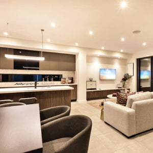 Modern living room with kitchen in a stylish home interior