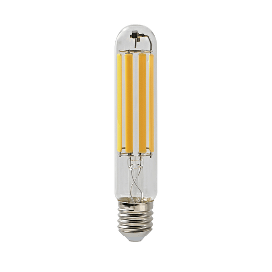 Clear LED light bulb on a green background