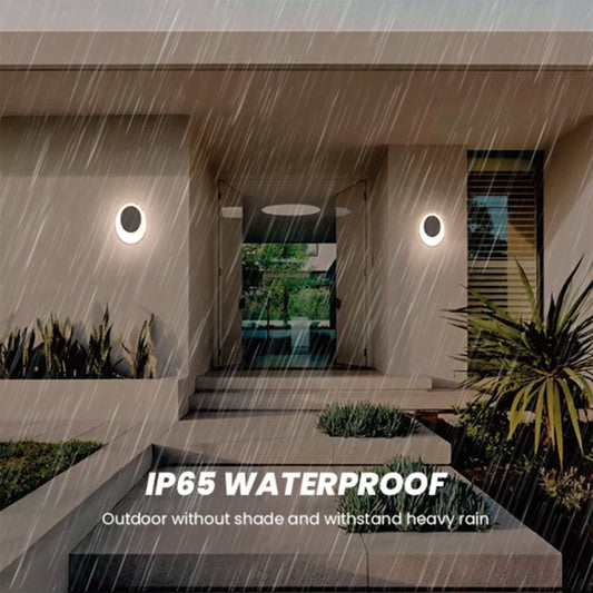 Outdoor setting with waterproof wall lights during rain, emphasizing durability.