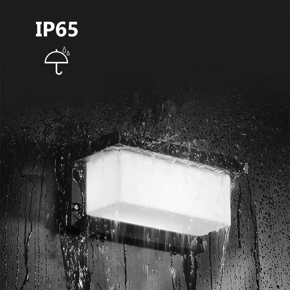 Ultralight LED Wall Sconce (BD3112) illuminated outdoor fixture with water resistance rating IP65 in heavy rain.