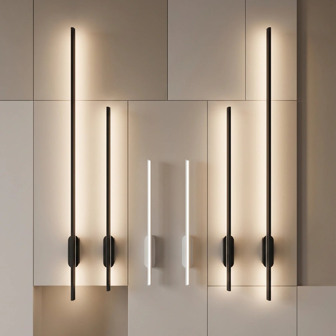 Modern wall lights on a neutral tiled wall