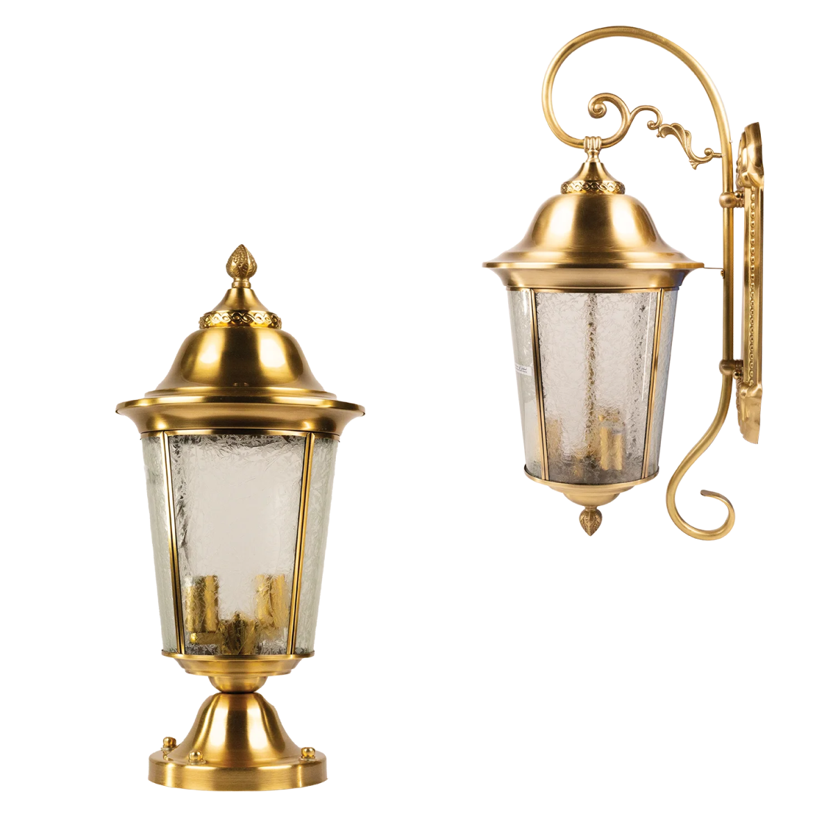 Two gold outdoor wall lights with glass shades on a white background