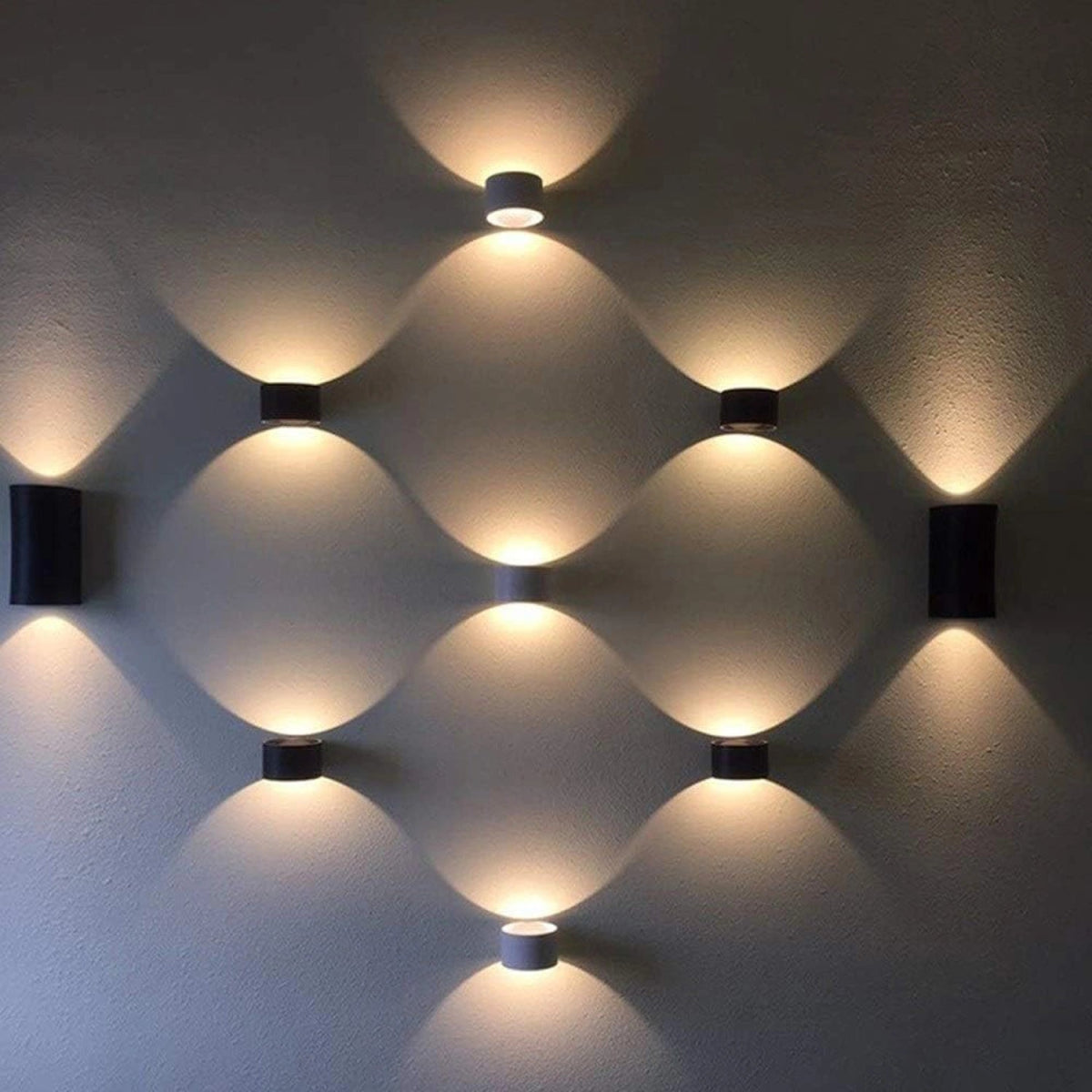 Geometric wall light fixture on a textured wall