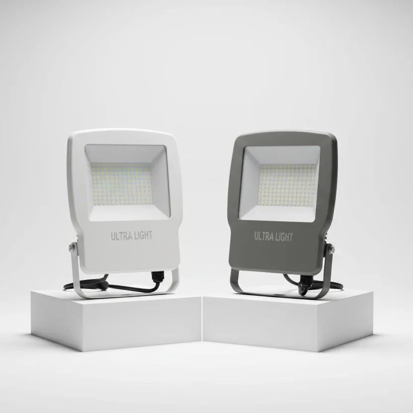 Two ultra light flood lights on white stands with a white background