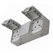Gray electrical junction box with multiple sockets on a white background