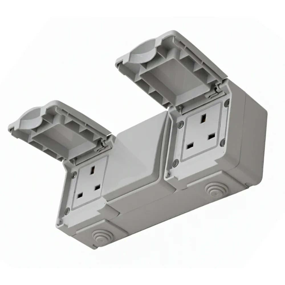 Gray electrical junction box with multiple sockets on a white background