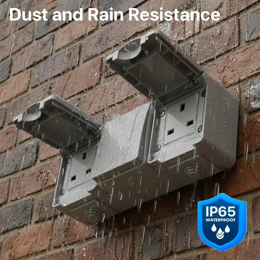 Outdoor electrical box with rain simulation on a brick wall, featuring IP65 waterproof rating.