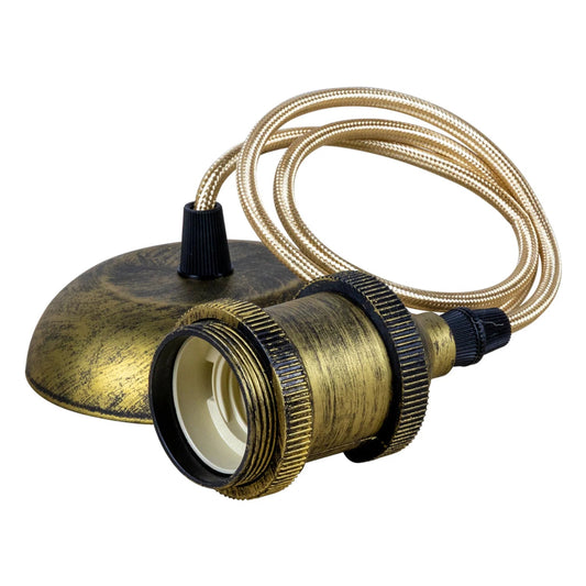 Brass lampshade with black interior and beige cord on a white background