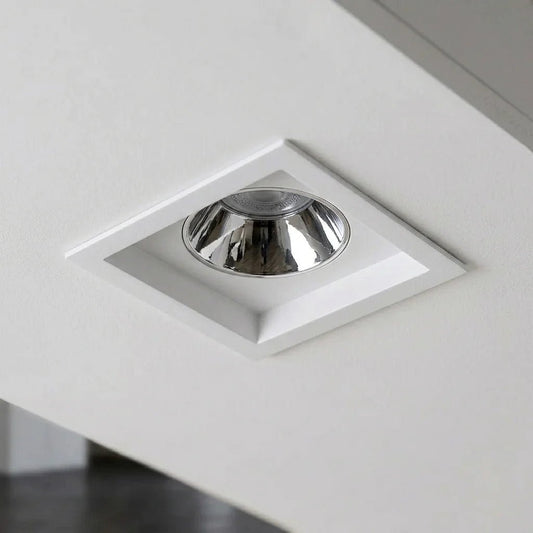 Square recessed ceiling light with chrome finish on a white ceiling