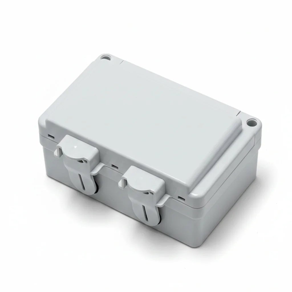 Gray plastic box with two latches on a white background