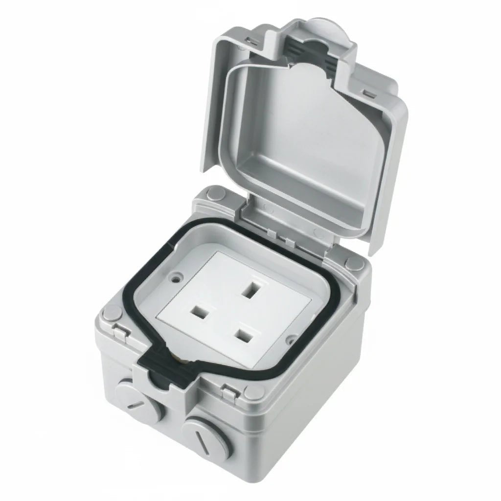 Metallic electrical socket cover with a white socket inside on a white background