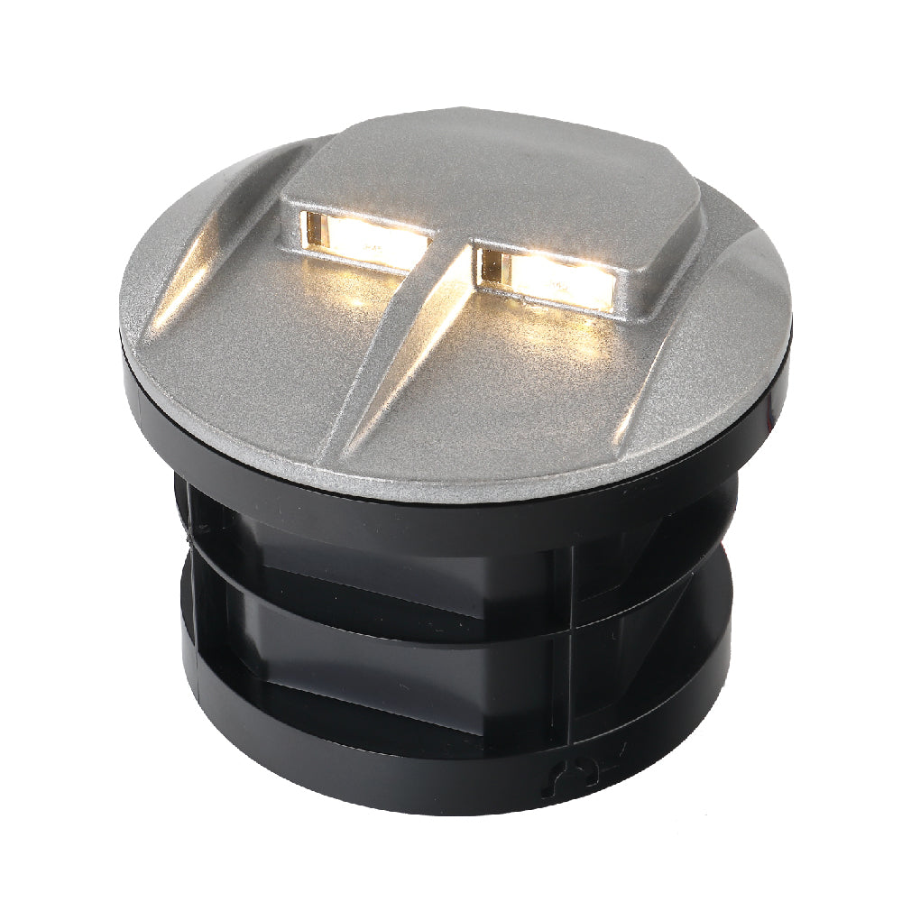 Outdoor light fixture with green LED lights on a white background