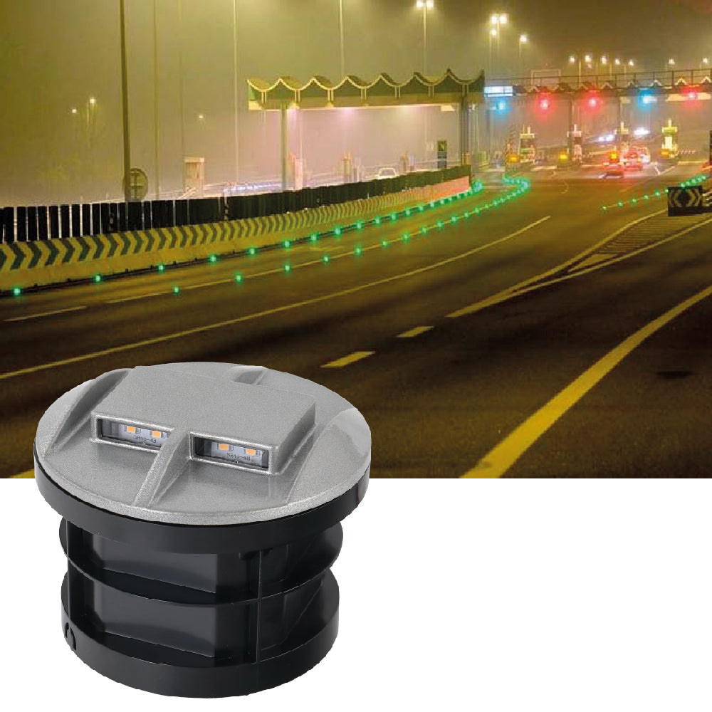 Outdoor light fixture with green LED lights on a white background