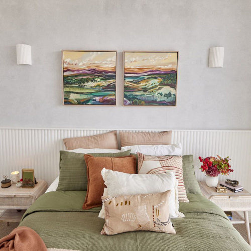 Ultralight Modern Wall Light (TK-G166) mounted above a bed, illuminating a cozy, stylish bedroom with neutral tones.