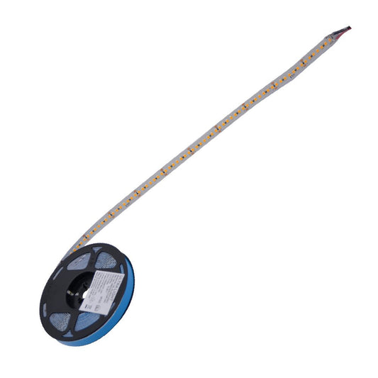 Spool of LED strip light on a white background