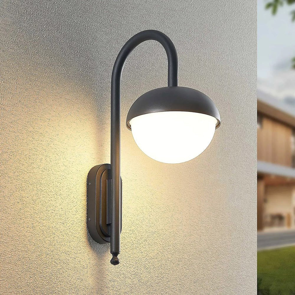 Ultralight Modern Wall Light (FYL0228A) glowing with sleek black frame mounted on outdoor wall at dusk.