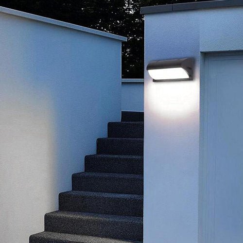 Ultralight Modern Wall Light (S/001) mounted outdoors illuminating stairs with bright, energy-efficient LED light.