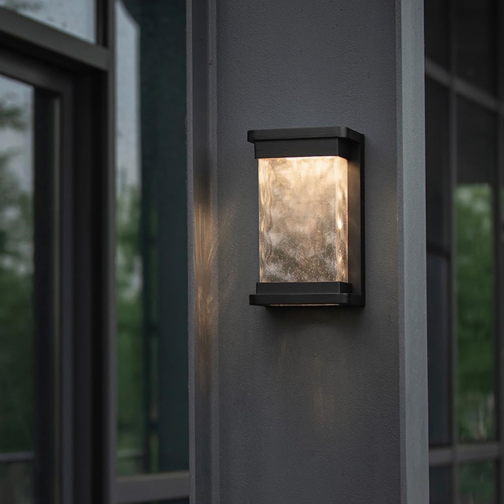 Ultralight Modern Wall Light (ULT-1003) mounted outdoors with soft, energy-efficient LED illumination on dark wall.