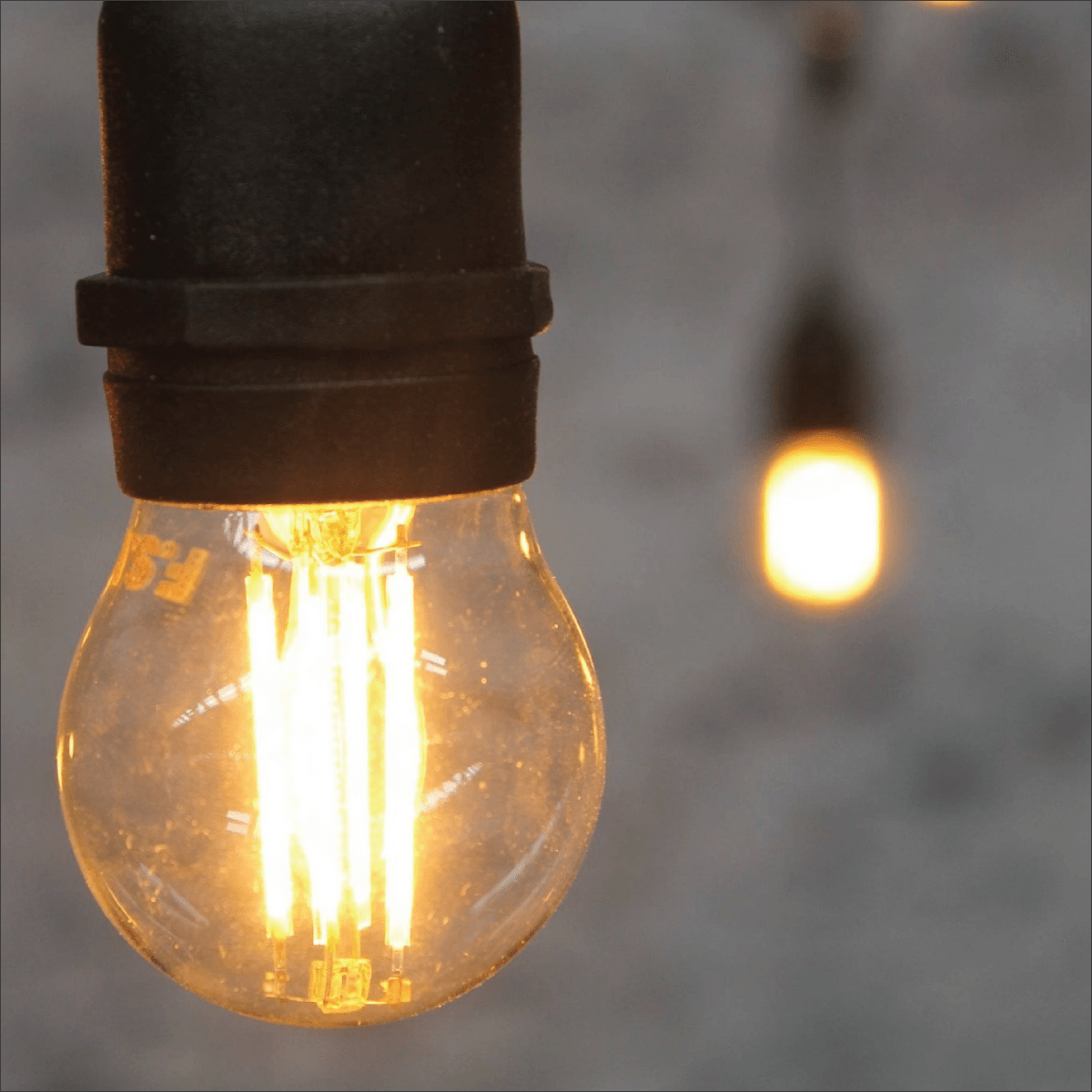 Vintage-style light bulb with a blurred background