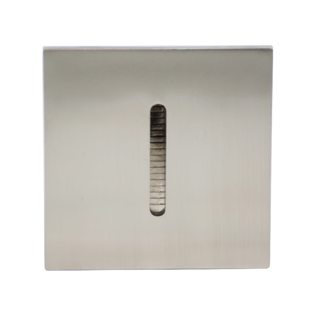 Rectangular metal cover with a central slot on a white background